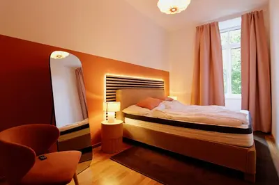 Ein Bett oder Betten in einem Zimmer der Unterkunft Stylish Home in Viennas Central 9th District