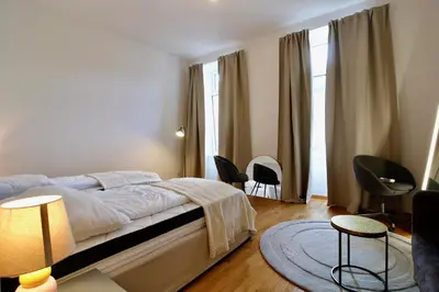 Ein Bett oder Betten in einem Zimmer der Unterkunft Stylish Home in Viennas Central 9th District