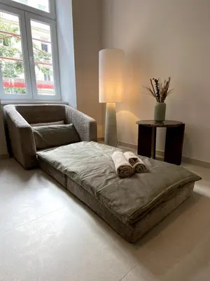 Ein Bett oder Betten in einem Zimmer der Unterkunft Residence K - Contemporary Altbau Studio Vienna