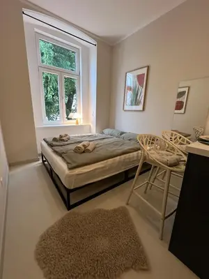Ein Bett oder Betten in einem Zimmer der Unterkunft Residence K - Elegant Studio - Smart Living Vienna