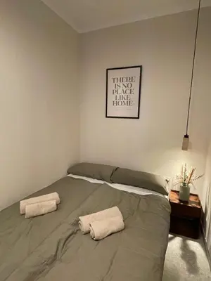 Ein Bett oder Betten in einem Zimmer der Unterkunft Residence K - Authentic Charm & Modern Ease