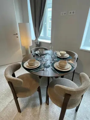 Ein Sitzbereich in der Unterkunft Residence K - Authentic Charm & Modern Ease