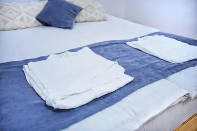 Ein Bett oder Betten in einem Zimmer der Unterkunft Barbara Apartment