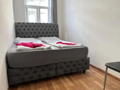 Ein Bett oder Betten in einem Zimmer der Unterkunft Prime location in Vienna - Comfortable 3BR & 1LR Apt