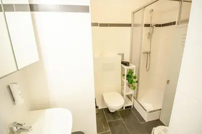 Ein Badezimmer in der Unterkunft Elegant City Living