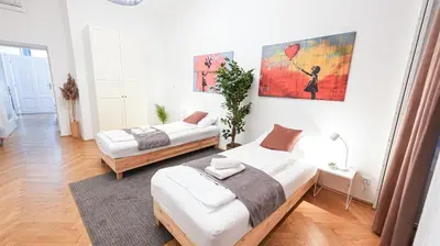 Ein Bett oder Betten in einem Zimmer der Unterkunft Three Bedroom Apartment - Vienna City Center
