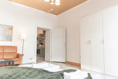 Ein Bett oder Betten in einem Zimmer der Unterkunft Neighboring 3 Apts,- Ideal for Families & Friends