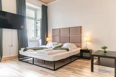 Ein Bett oder Betten in einem Zimmer der Unterkunft Neighboring 3 Apts,- Ideal for Families & Friends