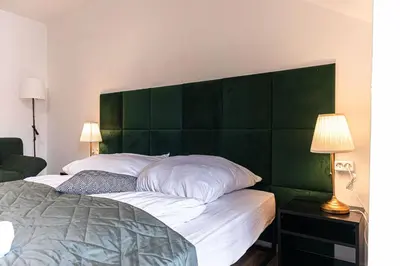 Ein Bett oder Betten in einem Zimmer der Unterkunft Beautiful 2BR Apt, Near U6 Station am Schöpfwerk