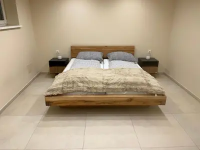Ein Bett oder Betten in einem Zimmer der Unterkunft Apartment P&T