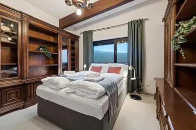 Ein Bett oder Betten in einem Zimmer der Unterkunft Wellnes Villa Wienerwald - heated Indoor Pool