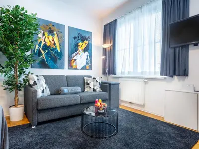 Ein Sitzbereich in der Unterkunft Superior Studio at St Stephen's Cathedral City Center