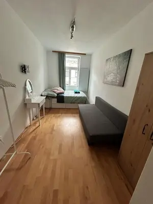 Ein Bett oder Betten in einem Zimmer der Unterkunft Cozy family apartment