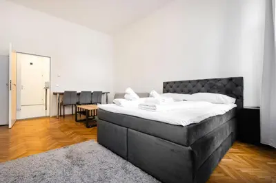 Ein Bett oder Betten in einem Zimmer der Unterkunft Harmony-Heights Apartment
