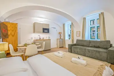 Ein Bett oder Betten in einem Zimmer der Unterkunft Air Con I free parking I floor heating