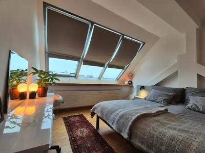 Ein Bett oder Betten in einem Zimmer der Unterkunft Rooftop Loft