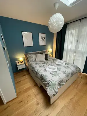 Ein Bett oder Betten in einem Zimmer der Unterkunft Wiener Townhouse Riesenrad