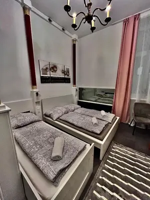 Ein Bett oder Betten in einem Zimmer der Unterkunft Vienna-Guestroom