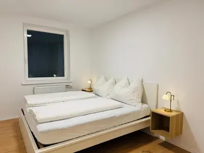 Ein Bett oder Betten in einem Zimmer der Unterkunft Schönbrunn Central Apartment