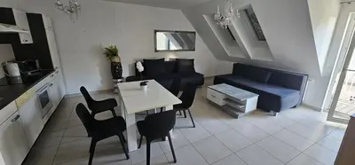 Ein Sitzbereich in der Unterkunft Vienna Airport Residences