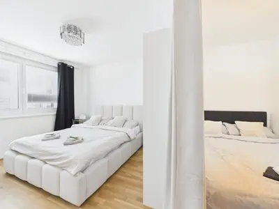 Ein Bett oder Betten in einem Zimmer der Unterkunft Terrace apartment near Donau