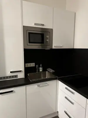 Küche/Küchenzeile in der Unterkunft GG Immobilien-15 min to city centre