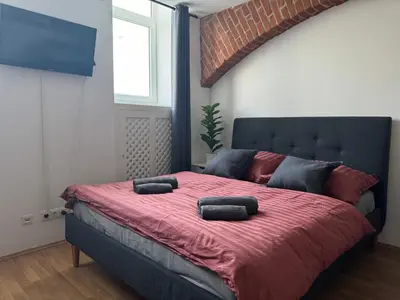 Ein Bett oder Betten in einem Zimmer der Unterkunft Classy Refined Apartment