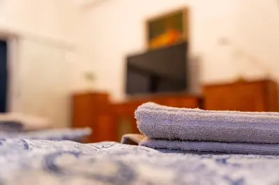 Ein Bett oder Betten in einem Zimmer der Unterkunft Superior Suites Vienna - L'Opera