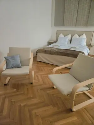 Ein Sitzbereich in der Unterkunft Urania City Residence