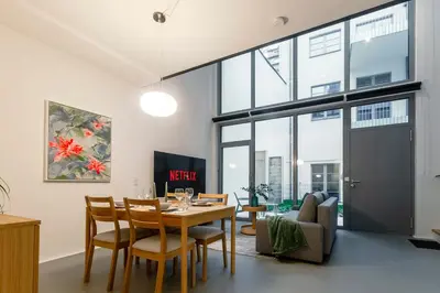 TV/Unterhaltungsangebot in der Unterkunft Bauhaus-Loft - Garten mit Terrasse - 20min zu Wien Mitte - Smart TV