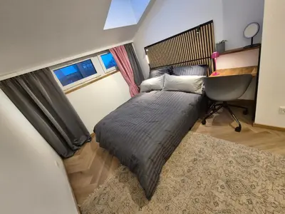 Ein Bett oder Betten in einem Zimmer der Unterkunft Rooftop Loft 2