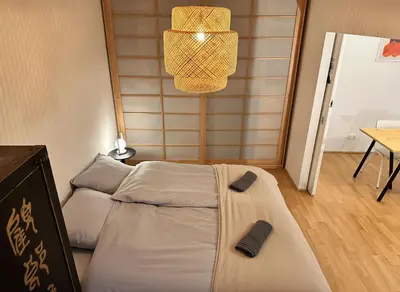 Ein Bett oder Betten in einem Zimmer der Unterkunft Japan Style Loft, Ruhig und elegant, Longsstay friendly