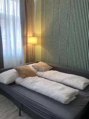 Ein Bett oder Betten in einem Zimmer der Unterkunft Green Urban Cozy Free Parking Nähe U Bahn