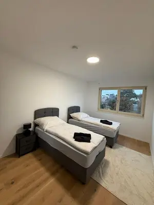 Ein Bett oder Betten in einem Zimmer der Unterkunft My Deer Apartment