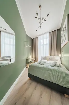 Ein Bett oder Betten in einem Zimmer der Unterkunft HOME1 - Belvedere Boutique Hostel