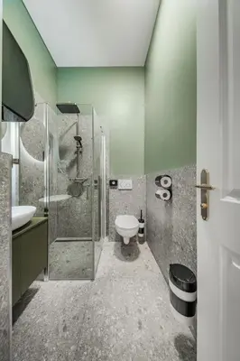 Ein Badezimmer in der Unterkunft HOME1 - Belvedere Boutique Hostel