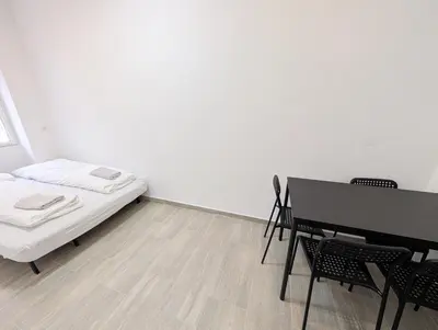 Ein Bett oder Betten in einem Zimmer der Unterkunft Cozy central apartment in Praterstern area