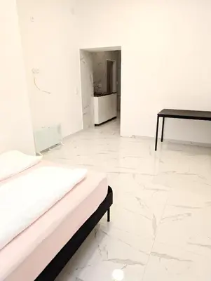 Ein Bett oder Betten in einem Zimmer der Unterkunft Cozy central apartment in Praterstern area 6A