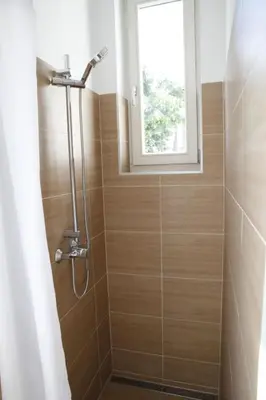 Ein Badezimmer in der Unterkunft Apartment Wohnen am Augarten by Interhome