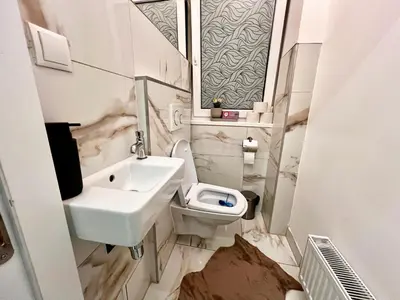 Ein Badezimmer in der Unterkunft TheWICKI 1706 - Wunderschöne Apartments in Wien