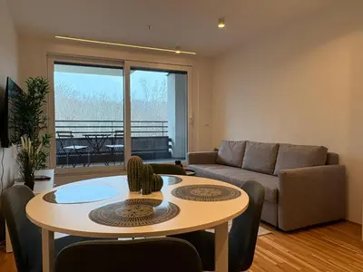 Ein Sitzbereich in der Unterkunft Parkapartments