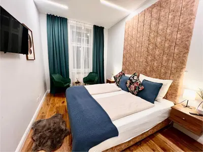 Ein Bett oder Betten in einem Zimmer der Unterkunft TheWICKI 1705 - Wunderschöne Apartments in Wien