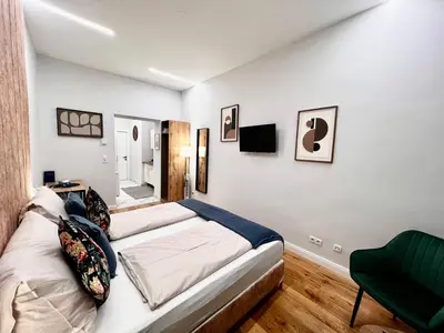 Ein Bett oder Betten in einem Zimmer der Unterkunft TheWICKI 1705 - Wunderschöne Apartments in Wien