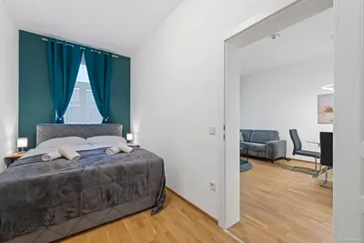 Ein Bett oder Betten in einem Zimmer der Unterkunft Nüll Residences 10 - 1 Bedroom with Parking Space