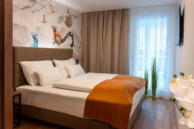 Ein Bett oder Betten in einem Zimmer der Unterkunft OLIVER pulse I Apartments with self check-in