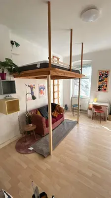 Ein Bett oder Betten in einem Zimmer der Unterkunft Cosy Central Charming Apartment