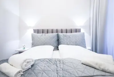 Ein Bett oder Betten in einem Zimmer der Unterkunft BRAND NEW! Apartment Elegance in Vienna's City Center