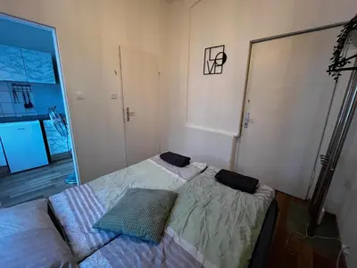 Ein Bett oder Betten in einem Zimmer der Unterkunft Schönbrunn Comfort Apartment I Meidling