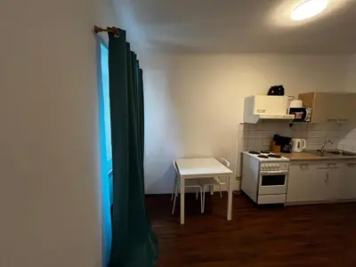 Küche/Küchenzeile in der Unterkunft Helle DG-Wohnung in Wien I Ruhig, modern & zentral