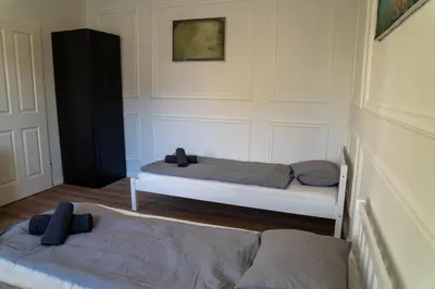 Ein Bett oder Betten in einem Zimmer der Unterkunft Family Apartment Schönbrunn I Modern & Zentral
